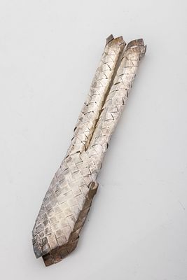 A STERLING SILVER LULAV HOLDER BY NETAFIM. Israel, C. 1990. Woven, like a regular lulav holder 