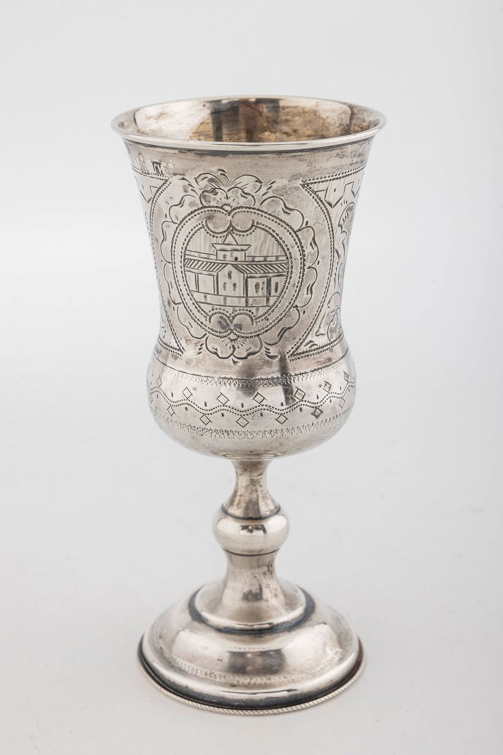 AN ANTIQUE RUSSIAN SILVER KIDDUSH GOBLET. C. 1880. On a traditional round base with a baluster 