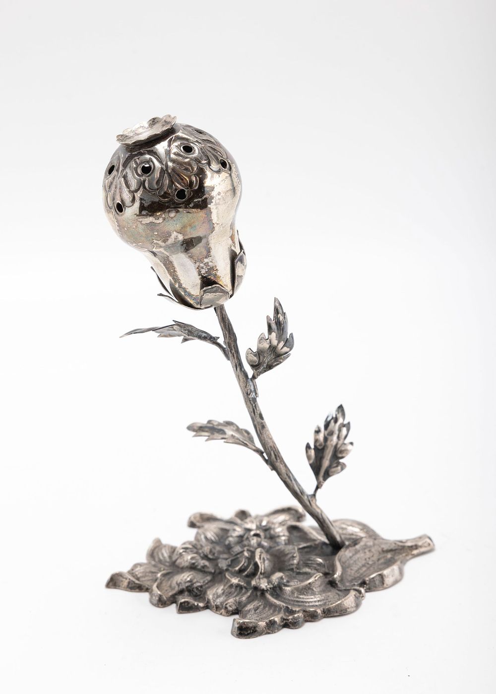 SILVER POMANDER SHAPED SPICE CONTAINER. Probably Poland, 20th century. On a floral shaped base with