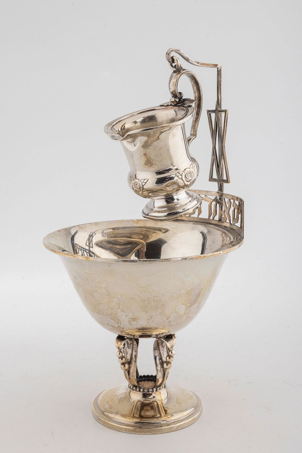 A LARGE STERLING SILVER MAYIM ACHRONIM SET. American, c. 1960. The bottom portion in Jensen-esqe 
