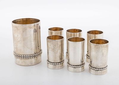 A STERLING SILVER KIDDUSH SET BY BIER SILVERSMITHS. Israel, modern. Beaker form. Each decorated 