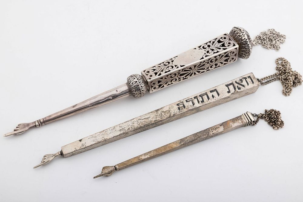 A GROUP OF THREE STERLING SILVER TORAH POINTERS. American, 20th century. The largest (10.7") in 