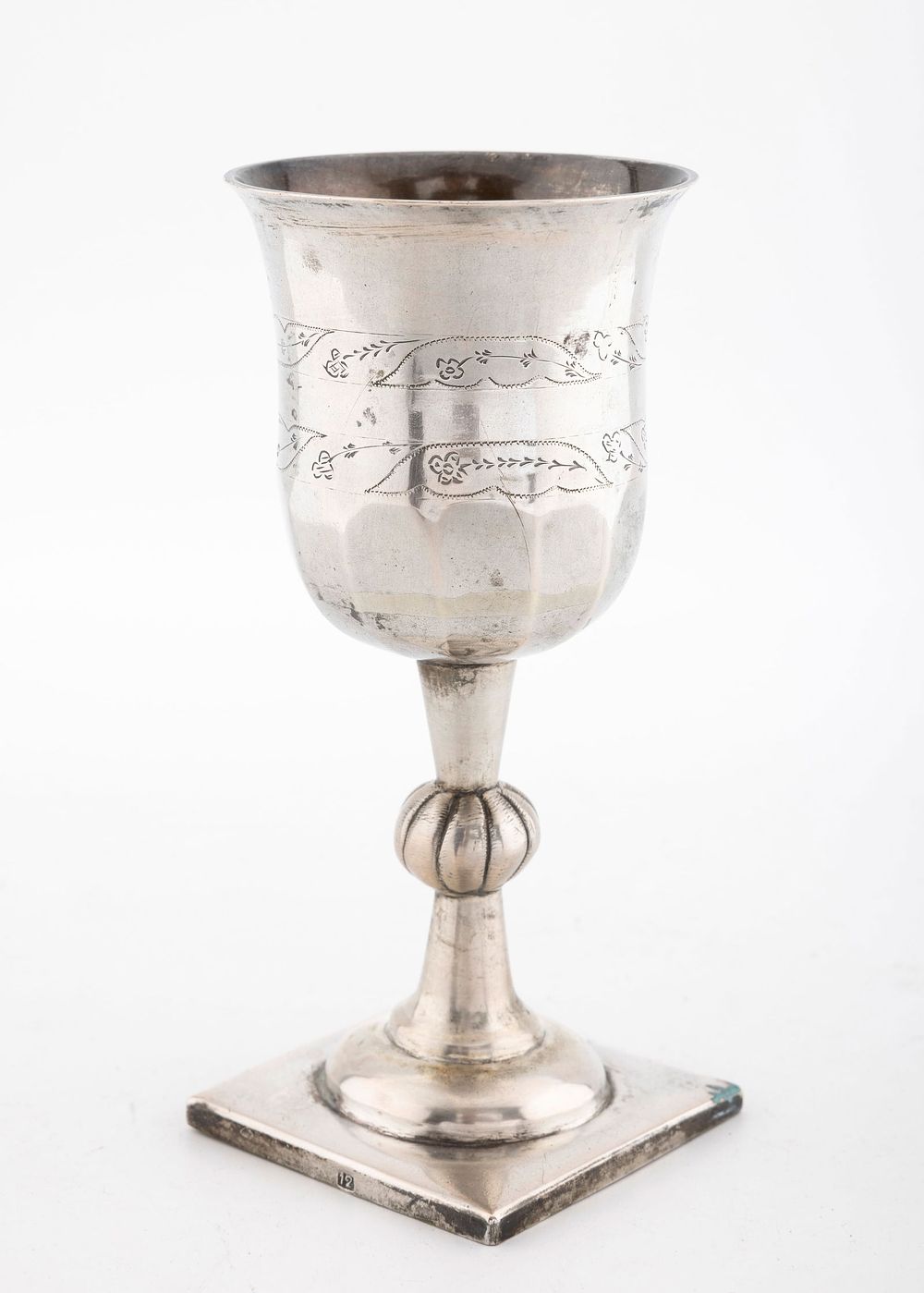 A LARGE SILVER KIDDUSH GOBLET. Poland, c. 1830. Exceptionally large for the style. On a flat 