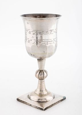 A LARGE SILVER KIDDUSH GOBLET. Poland, c. 1830. Exceptionally large for the style. On a flat 