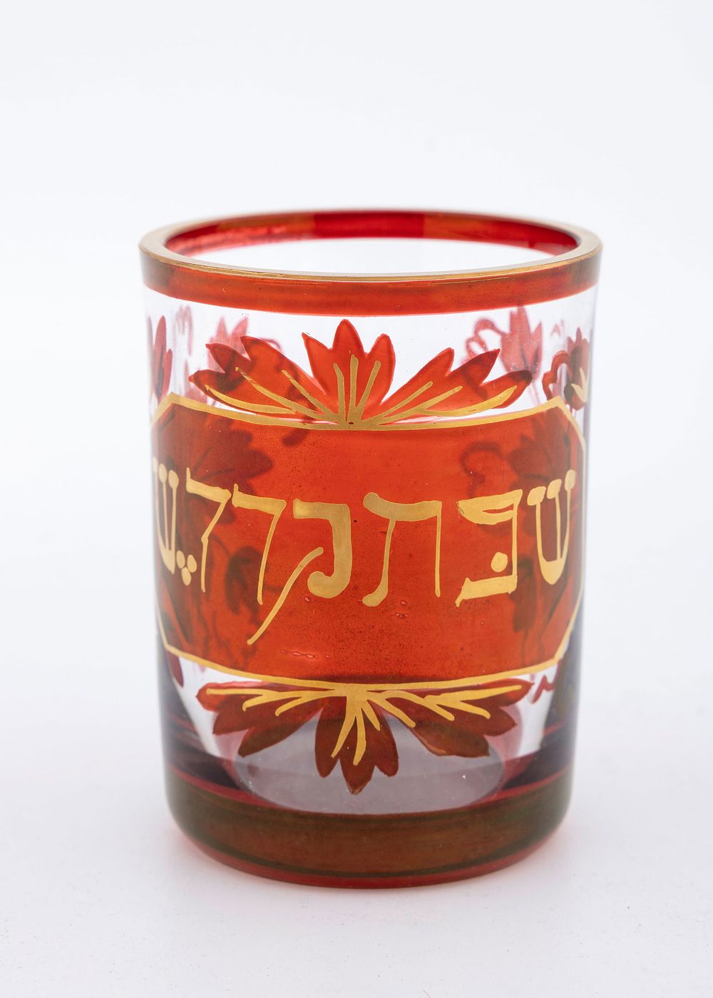 A RUBY GLASS KIDDUSH CUP. Bohemian, 19th century. Amazing condition. Painted in gold leaf, “THE 