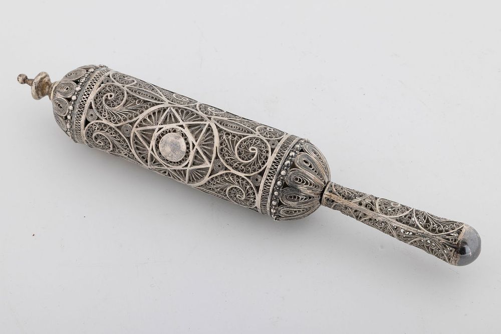 A SILVER MEGILLAH CASE WITH THE ORIGINAL MEGILLAH. Jerusalem, c. 1940. Traditional form. 