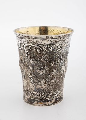 A SILVER KIDDUSH CUP. Germany, c. 1880. Embossed with pomegranates and other fruits. Interior 