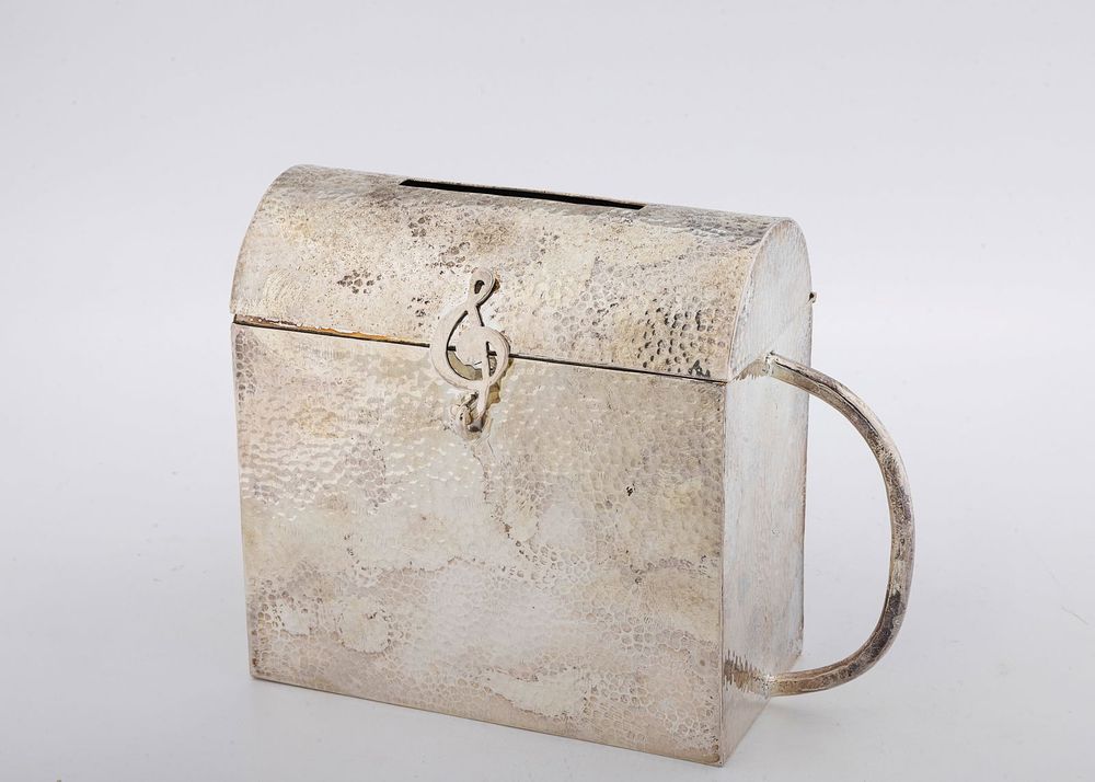 A HAND WROUGHT STERLING SILVER CHARITY CONTAINER. American, c.2000. In the shape of a matzeivah. 