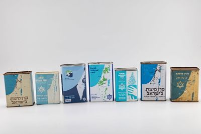 A COLLECTION OF SEVEN JNFCHARITY CONTAINERS. Spanning 1930 to modern times. Various countries.