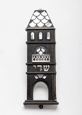 FINE EBONY AND SILVER MEZUZAH BY CATRIEL SUGARMAN. Jerusalem. 1986.Hand made in the form of the 