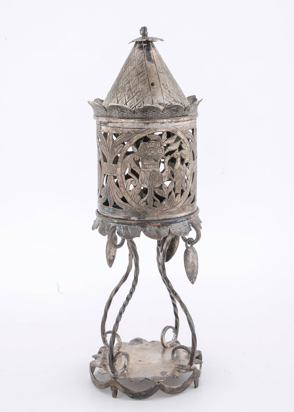 AN EARLY SILVER SPICE CONTAINER. Poland, c. 1840. On a sunflowe shaped supporting base with four 