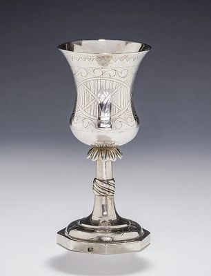 A LARGE SILVER KIDDUSH GOBLET. Poland, c.1820. On an octagonal base with a skirted stem. Upper 