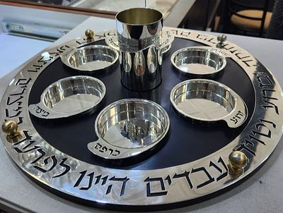 A STERLING SILVER AND ANODIZED ALUMINUM PASSOVER SEDER PLATE BY RAFI LANDAU. Israel, c.2010. 