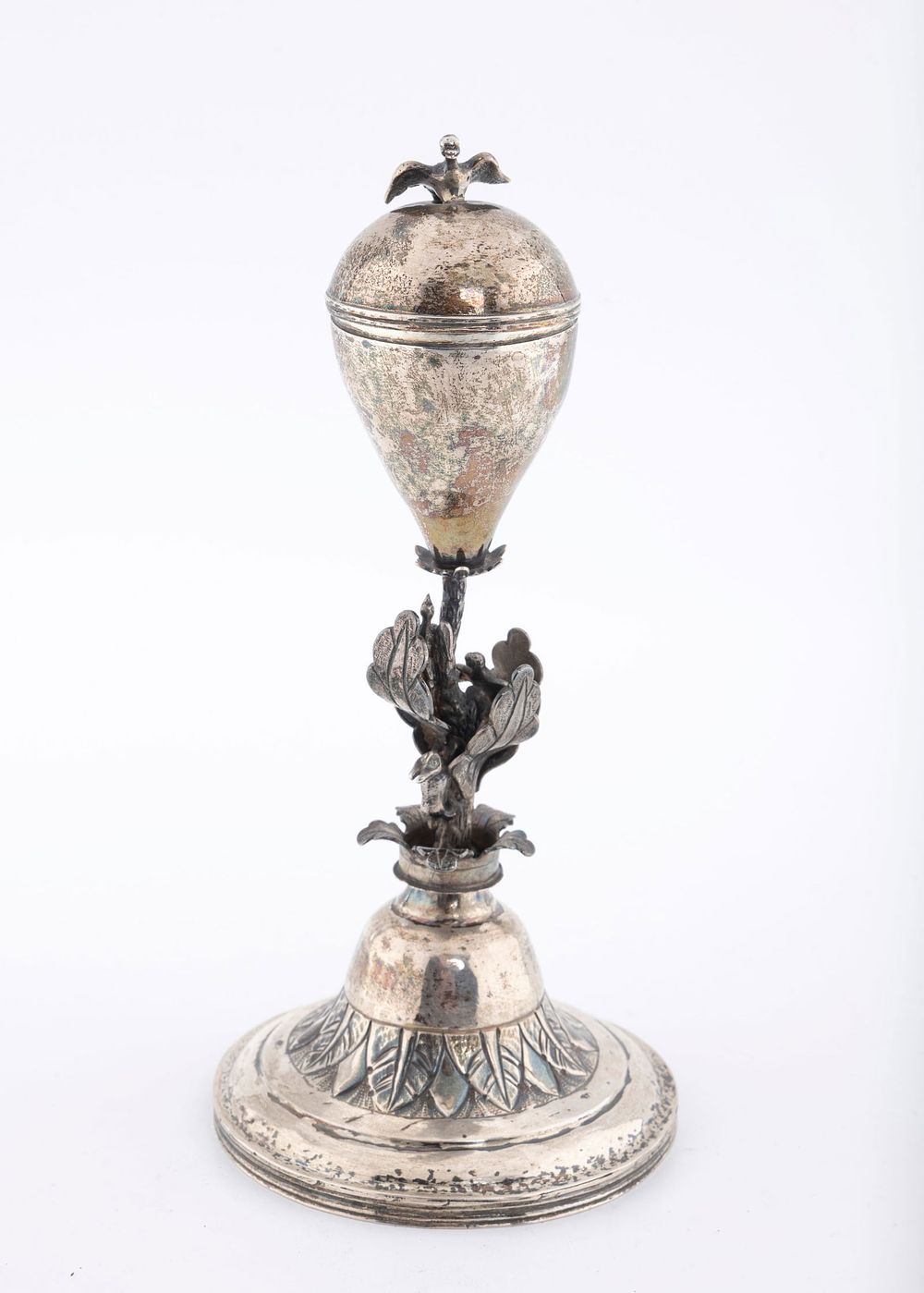 A LARGE SILVER SPICE CONTAINER. Probably Poland. On a round chased base. The stem filled with 