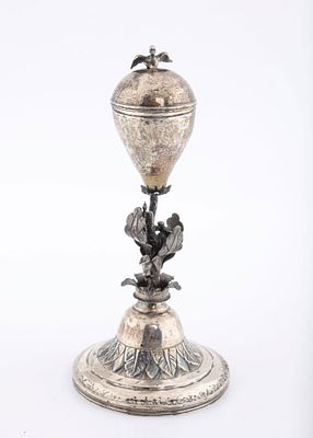 A LARGE SILVER SPICE CONTAINER. Probably Poland. On a round chased base. The stem filled with 