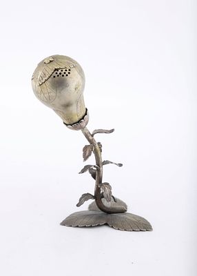 A SILVER SPICE CONTAINER. Poland, c. 1850. On a three leaf base with leave and branch shaped 