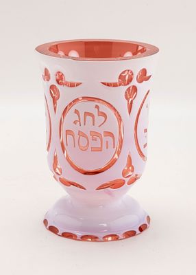 A LARGE RUBY GLASS PASSOVER GOBLET. Probably Italian, Early 20th century. With a white outer 