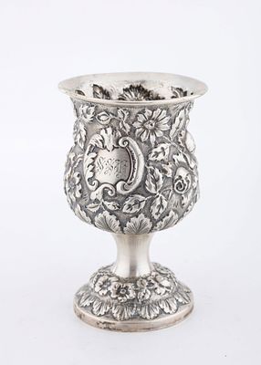A STERLING SILVER REPOUSEE GOBLET BY STEIFF. On a hand embossed base with a large upper portion. 