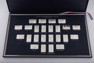 FRANKLIN MINT: STERLING SILVER OLYMPIC POSTAGE STAMP MEDALS 1984. 24 sterling silver medals 