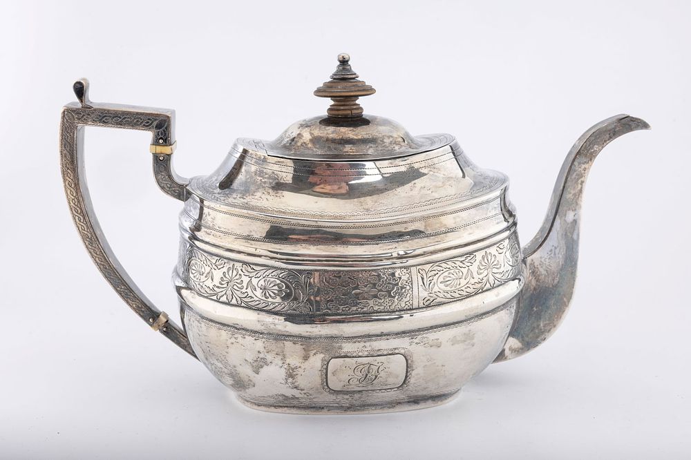 A GEORGIAN SILVER TEAPOT BY NAPHTALI HART & DUNCAN URQUHART LONDON 1789. Traditional form. Some 
