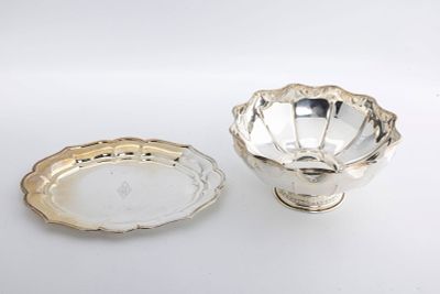 A STERLING SILVER FOOTED BOWL AND SERVING DISH. The serving dish by Spaulding and Company (8.8" 