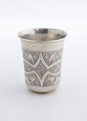 A SILVER KIDDUSH OR VODKA BEAKER CUP. Russia, 1875. Simple beaker form with bright cut 