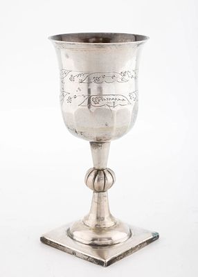 A LARGE SILVER KIDDUSH GOBLET. Poland, c. 1830. Exceptionally large for the style. On a flat 