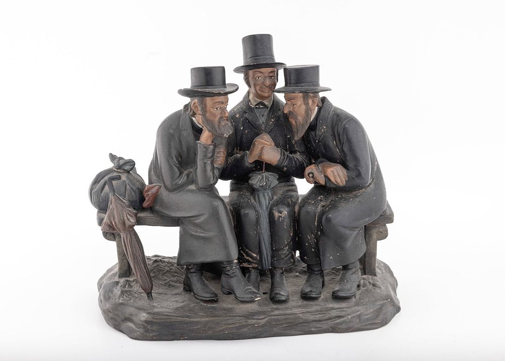 A LARGE FIGURINE OF THREE JEWS IN DISCUSSION. Czechoslovakia, c. 1920. Three orthodox Jewish men 