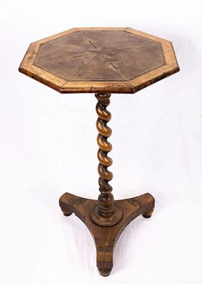 AN EARLY JERUSALEM OLIVEWOOD TABLE. On a tipod base with decorated stem that leads to a multiple 