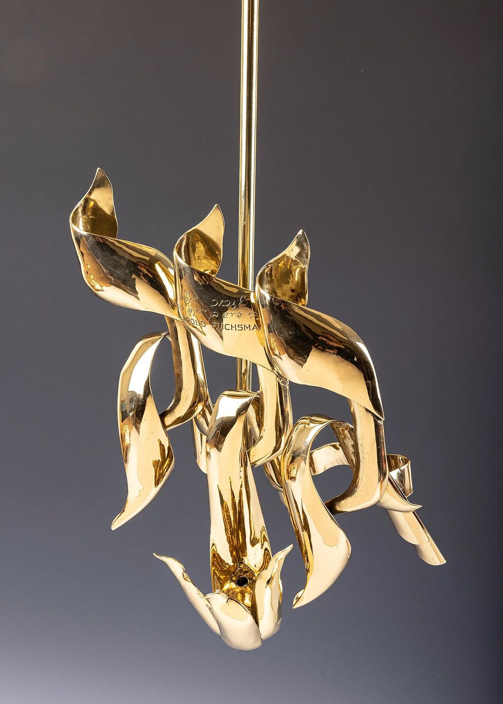 A LARGE POLISHED BRASS ETERNAL LIGHT. American, c. 1960's. Hand formed with three letter kuf 