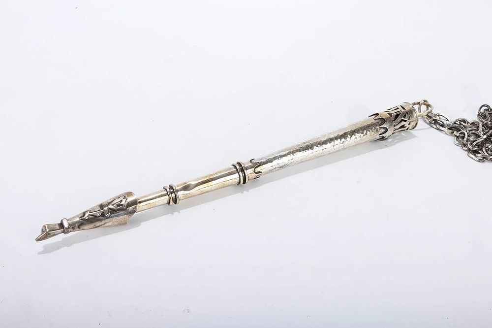 A STERLING SILVER TORAH POINTER. Probably Israel, c. 1970. Hand hammered body with stylized 