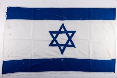 AN EARLY ISRAEL FLAG. Sewn from blue and white linen. 24" x 40"