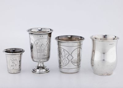 A GROUP OF FOUR SILVER KIDDUSH CUPS. All in beaker form. Various sizes and shapes.187 grams