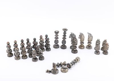 A GROUP OF 32 STERLING SILVER CHESS PIECES MADE IN ISRAEL. Made from hand woven filigree. Two 