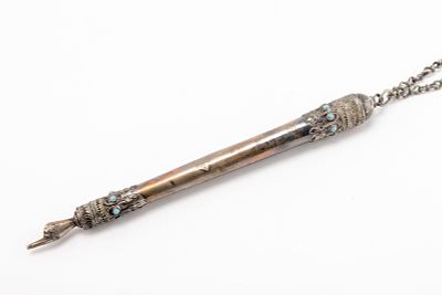 A STERLING SILVER TORAH POINTER. Israel, c. 1980. Tubular in shape with applied blue stones and 