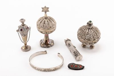 A GROUP OF SIX STERLING SILVER ITEMS FROM ISRAEL. Including a perfume bottle, two filigree spice 