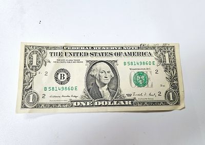 A SINGLE DOLLAR HANDED OUT BY THE LUBAVITCHER REBBE. A US single dollar handed out by the Rebbe. 