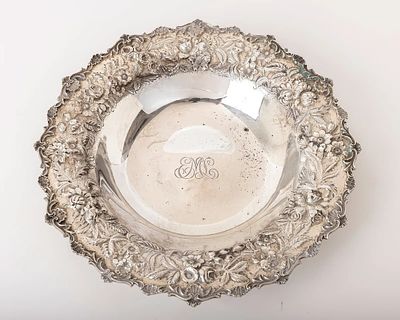 A LARGE STERLING SILVER SERVING DISH BY KIRK. Hand embossed in repousee design. 11.2 inches 