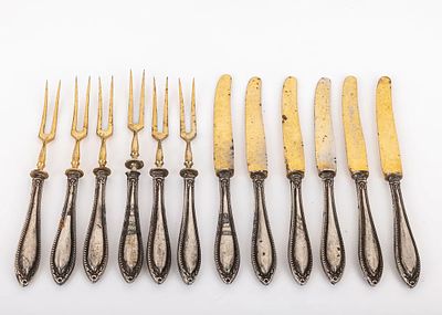 A SERVICE FOR 6 FRUIT SET. Germany, c. 1900. Consisting of silver handles and gilded upper 