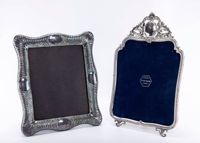 TWO STERLING SILVER PICTURE FRAMES. Both approximately 12.5" x 10". Both are marked.
