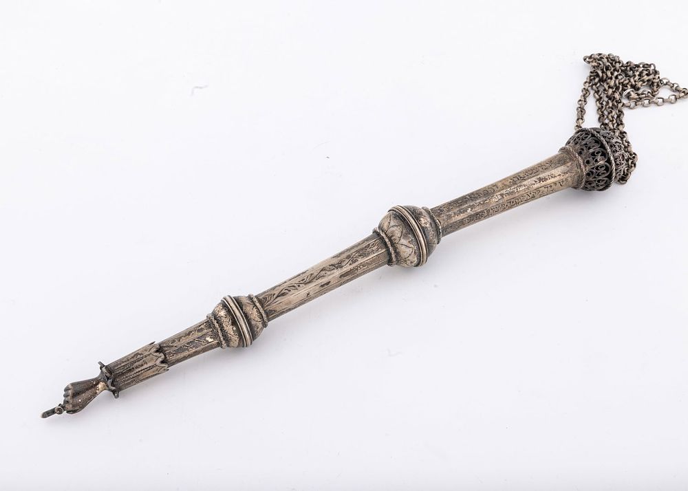 AN IMPORTANT SILVER TORAH POINTER. Poland, c. 1801. Comprised of three sections connected with 