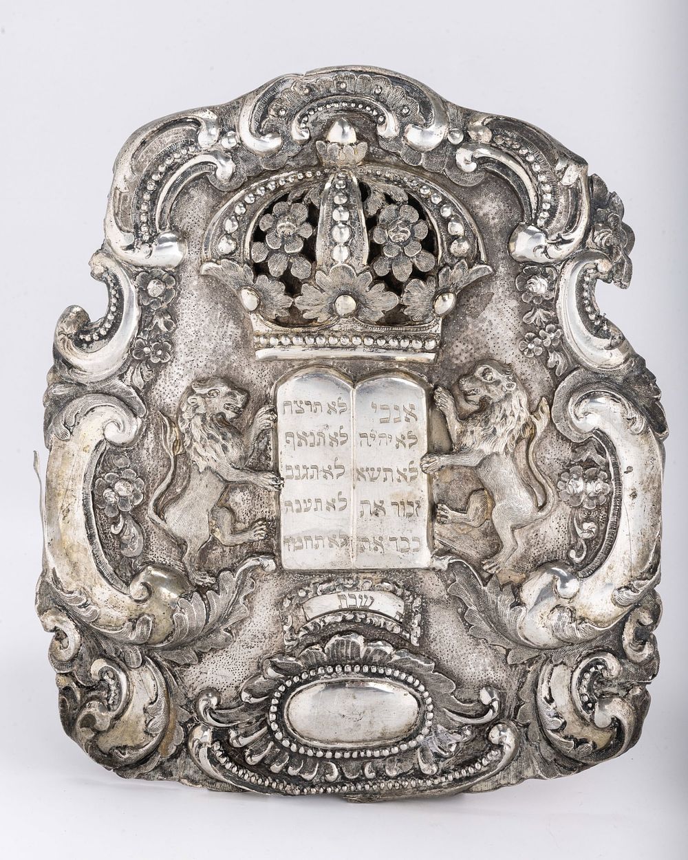 A LARGE SILVER TORAH SHIELD. Poland, c. 1860. In Austrian style. Decorated with two lions 