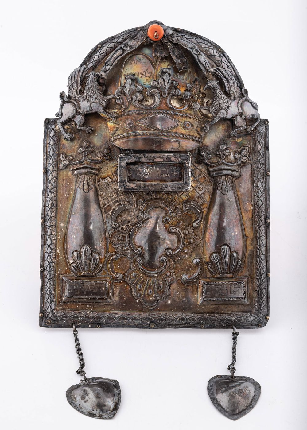 AN EARLY SILVER TORAH SHIELD. Poland, c. 1812. Tablet form. Decorated with scrolling designs, a 