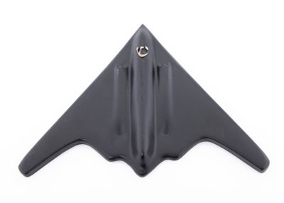 A HEAVY COPPER MEZUZAH IN THE SHAPE OF A B-2 BOMBER. Israel, modern. Copper with black gunmetal 