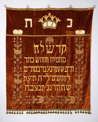 A LARGE PAROCHET FOR A HOLY ARK. 1893. Velvet backing, with gold colored embroidery that 