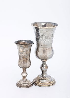 TWO STERLING SILVER KIDDUSH CUPS. American, c. 1920. By Russian silversmiths. The first one is 