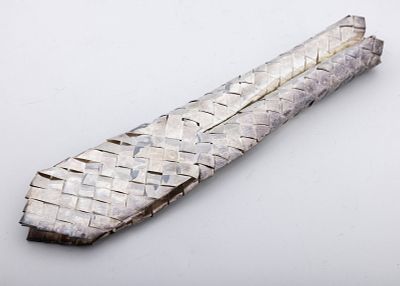 A STERLING SILVER LULAV HOLDER BY NETAFIM. Israel, C. 1990. Woven, like a regular lulav holder 