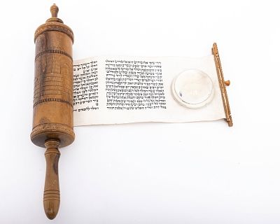 AN OLIVEWOOD MEGILLAH CASE WITH ORIGINAL MEGILLAH. Jerusalem, c. 1930. Hand engraved olive wood 
