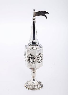 A STERLNG SILVER SPICE CONTAINER. Probably Israel, modern. On a round base with an embossed 