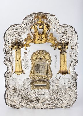 A LARGE SILVER TORAH SHIELD. American, c. 1920. Traditional in form. Decorated with two lions 